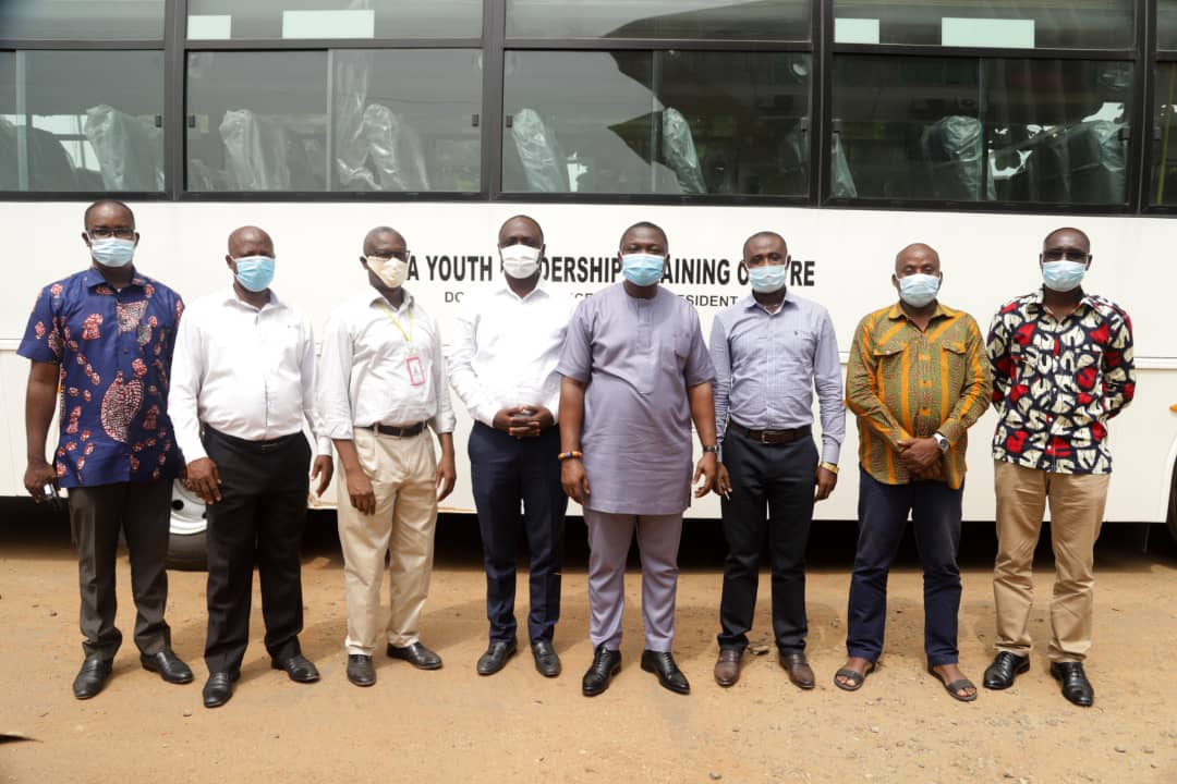 Acting CEO of NYA Mr. Nelson Owusu Ansah handing over A Bus to a Principal of the YLSTI